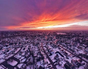 High angle view of townscape against sky during sunset