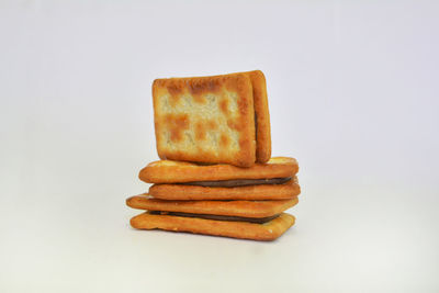 Close-up of bread against white background