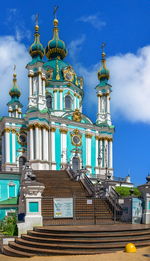 The st. andrew church and the andriyivskyy descent in kyiv, ukraine, on a sunny summer day