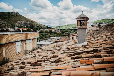 View of bell tower against cloudy sky