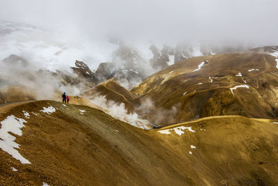 Scenic view of snowcapped mountains during winter