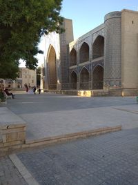 View of historic building with city in background