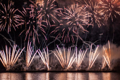 Firework display at night