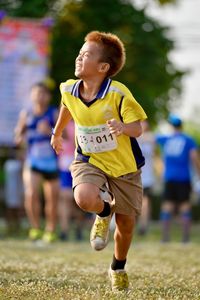Full length of a girl running
