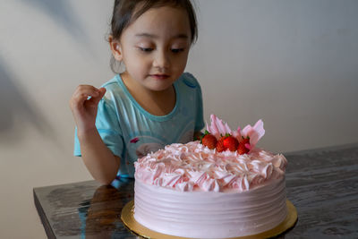 Asian cute little princess at 3rd birthday party.