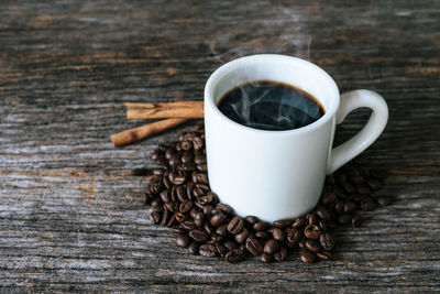 Close-up of coffee cup on table
