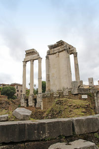 Old ruins against sky in city