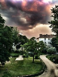 View of road against cloudy sky