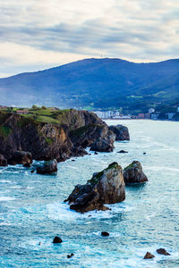 Beautiful rocks in the sea view from top of gaztelugatxe island, bilbao in northern spain