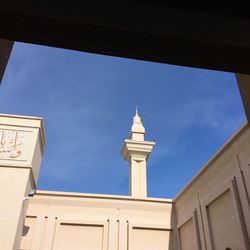 Low angle view of building against blue sky