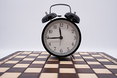 Close-up of clock on wall