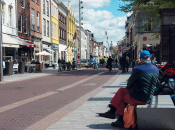 People on street in city during sunny day