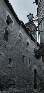 Low angle view of old building against sky