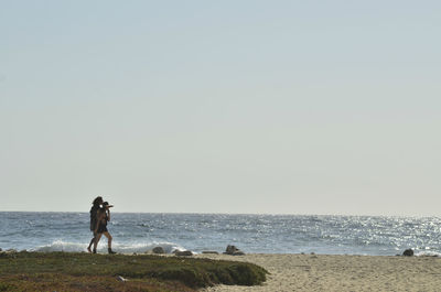 Scenic view of sea against clear sky