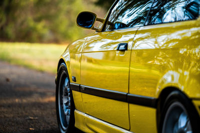 Close-up of yellow car