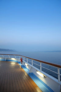 Scenic view of sea against blue sky