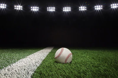 Close-up of baseball on field