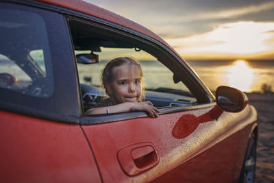 Portrait of boy in car