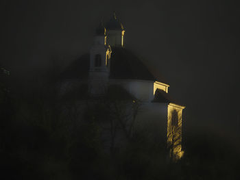 Illuminated church at night
