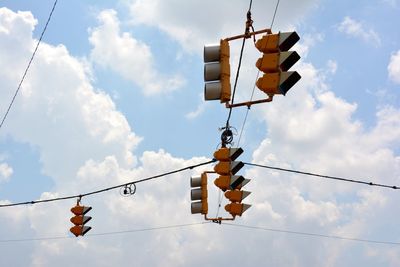 Low angle view of street light against sky