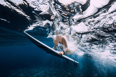 Man swimming in sea