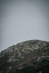 Scenic view of rocky mountains against clear sky