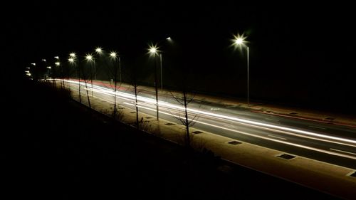 Light trails on road at night
