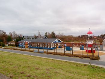 Park by building against sky