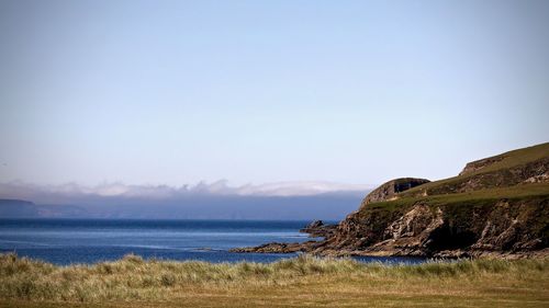 Scenic view of sea against clear sky