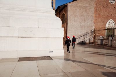 Men on zebra crossing