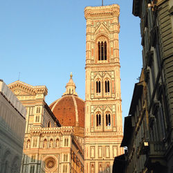 Low angle view of clock tower against sky