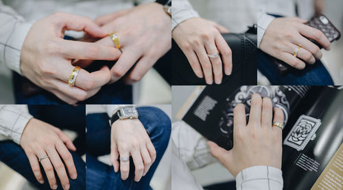 Midsection of couple holding hands