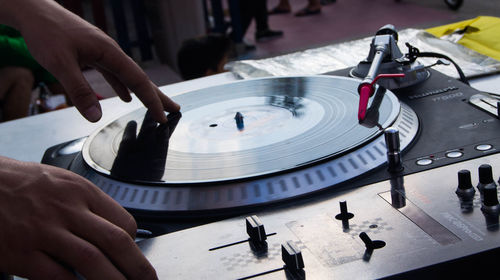 Midsection of man playing piano