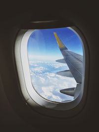 Cropped image of airplane wing