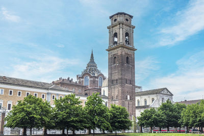 Beautiful bell tower in turin with the chapel of sindone in background