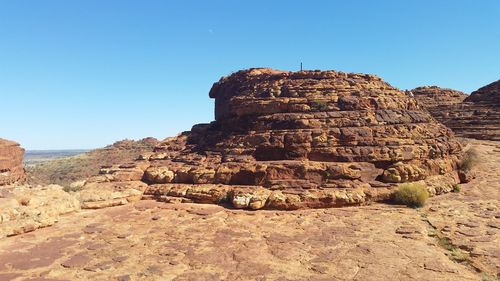 Scenic view of rock formation against clear blue sky