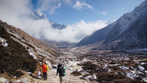 Panoramic view of snowcapped mountains against sky