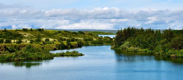 Scenic view of river against sky