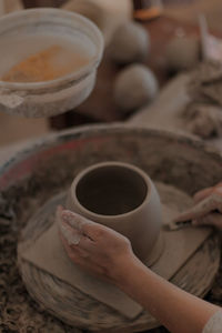 Low section of person preparing food