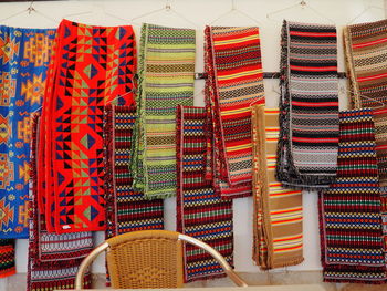 Multi colored blankets hanging for sale in market