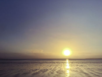 View of calm sea at sunset