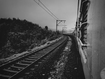 Railroad tracks against sky