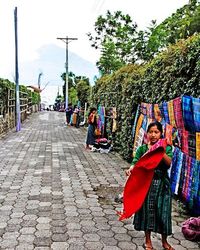 Panoramic view of people walking on street