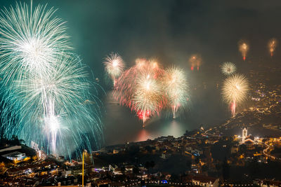 Firework display at night