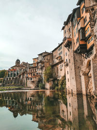 Houses on rock over river