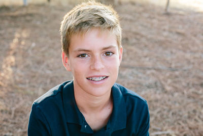 Portrait of a handsome teen boy with braces