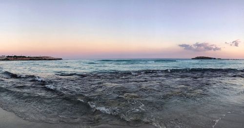 Scenic view of sea against sky during sunset