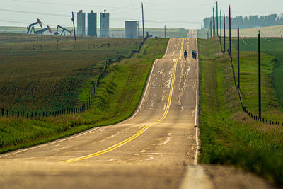 Panoramic view of road passing through land