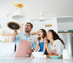 Group of people sitting on table