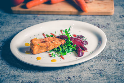 Close-up of food in plate on table